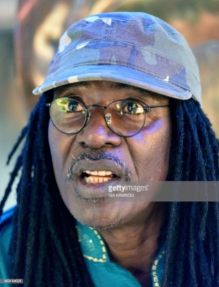 Ivorian reggae Alpha Blondy speaks during an interview at his radio station Alpha Blondy FM in Abidjan on March 17, 2015. AFP PHOTO/ SIA KAMBOU (Photo credit should read SIA KAMBOU/AFP/Getty Images)